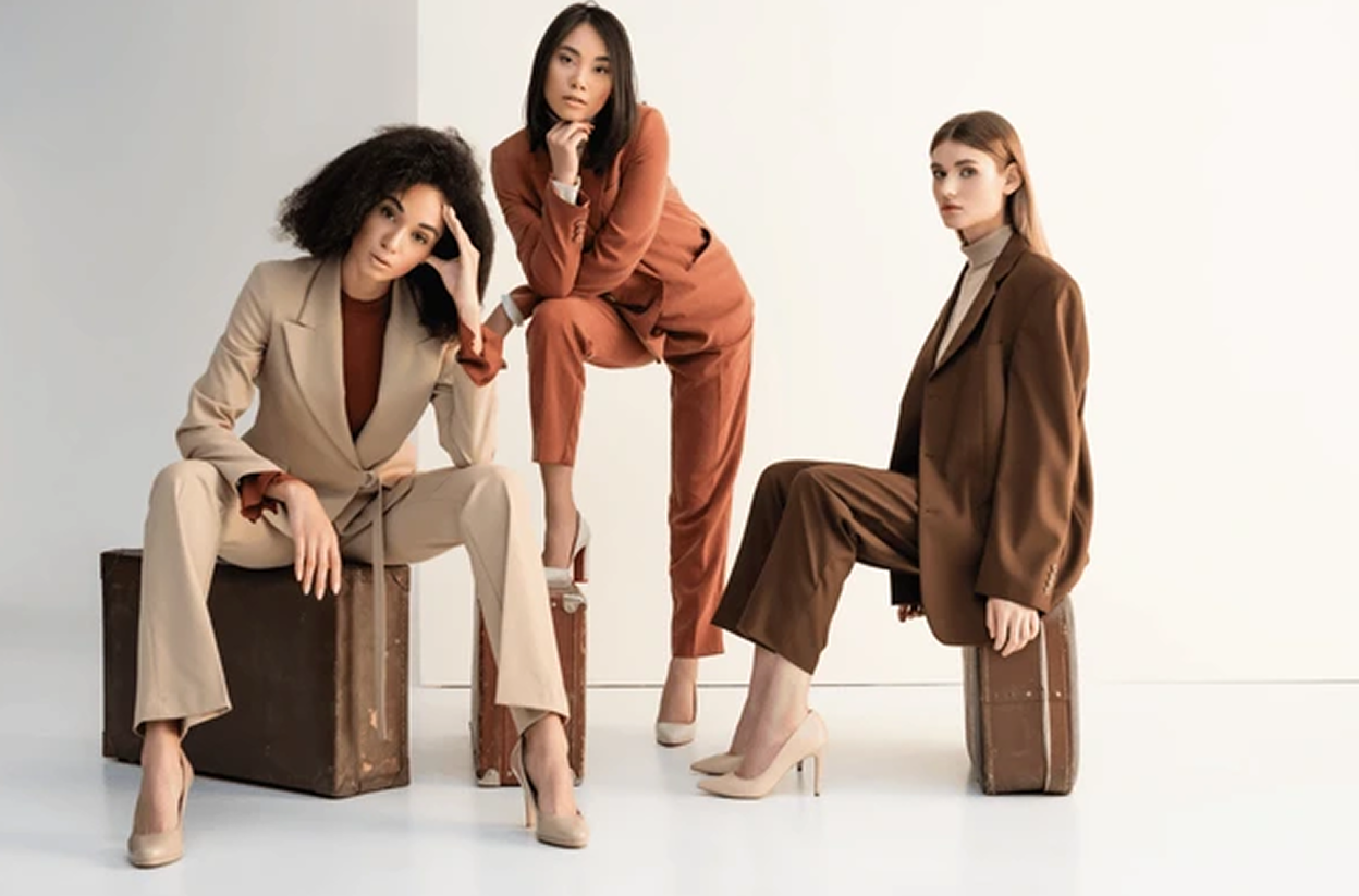 Fashion models in earth tone suits